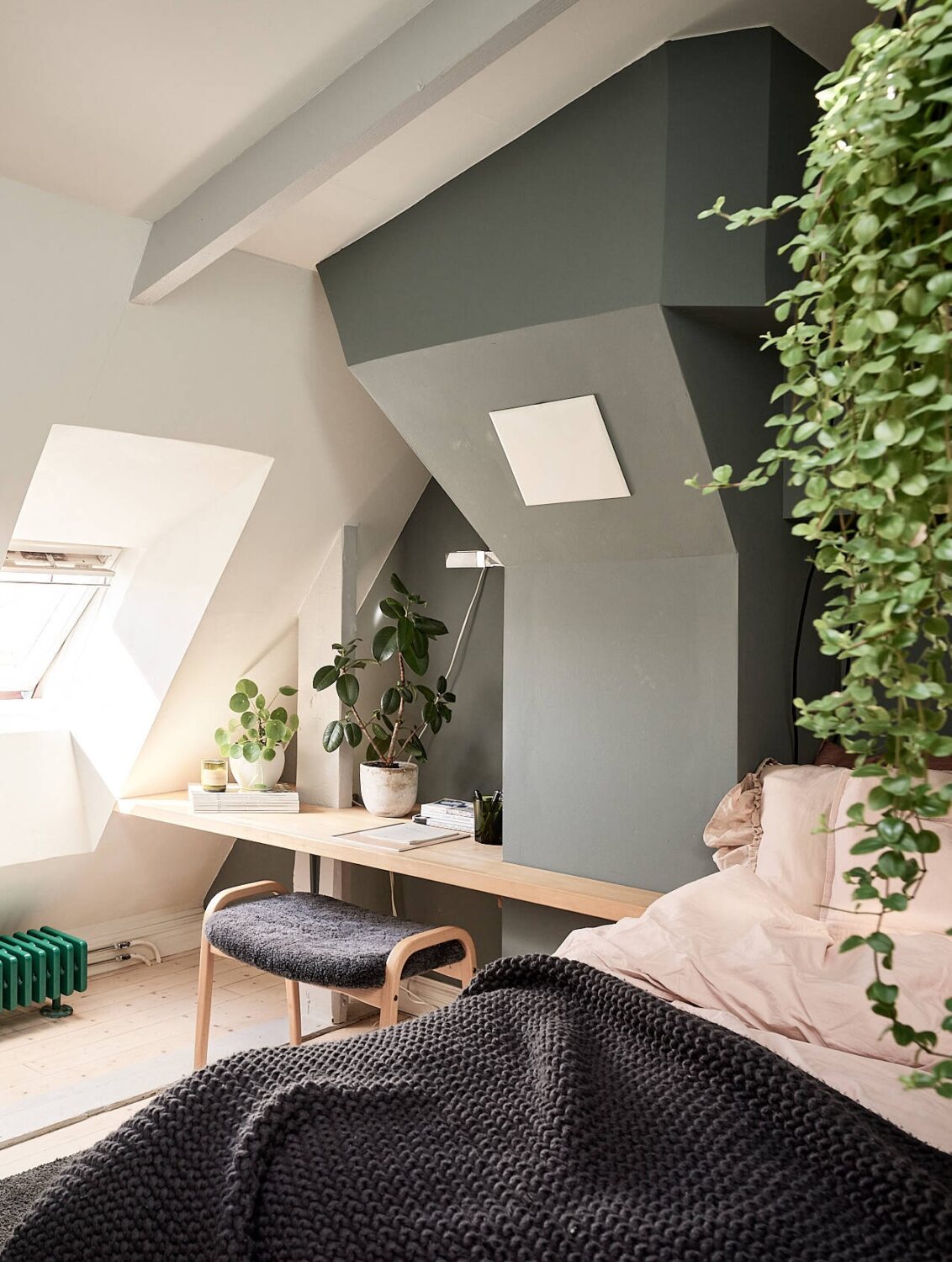 A Bedroom With Slanted Ceiling