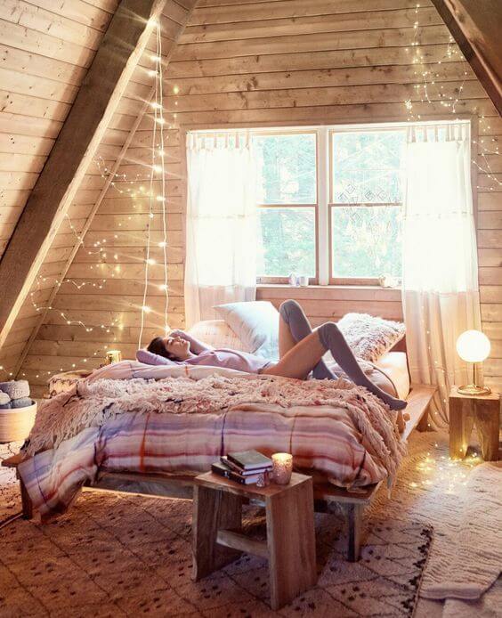 bohemian attic bedroom string lights nordroom How To Decorate A Bedroom with Sloped Ceiling
