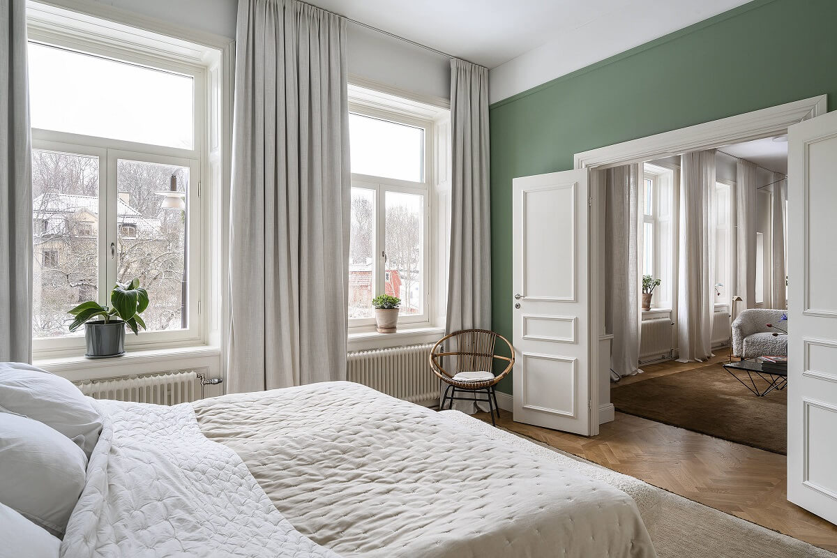 green-bedroom-double-doors-scandinavian-home-nordroom