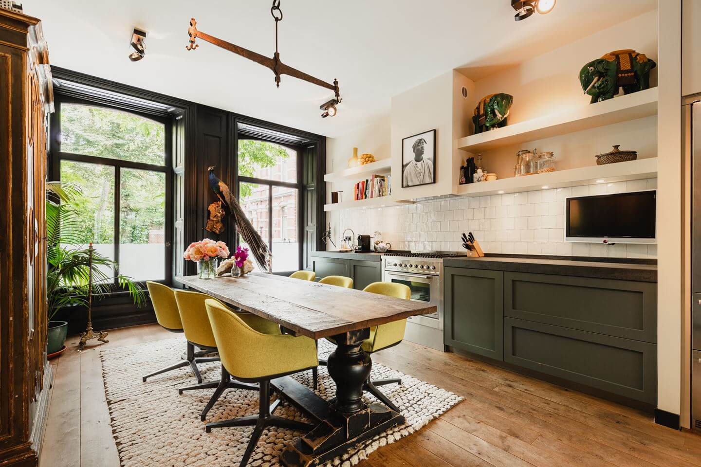green-kitchen-open-shelves-dining-table-yellow-dining-chairs-townhouse-amsterdam-nordroom