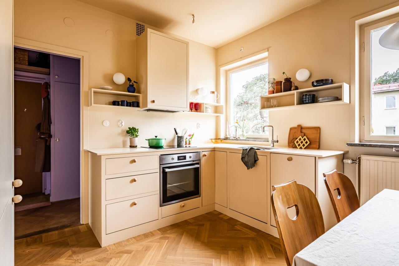 pale-yellow-kitchen-cabinets-walls-nordroom