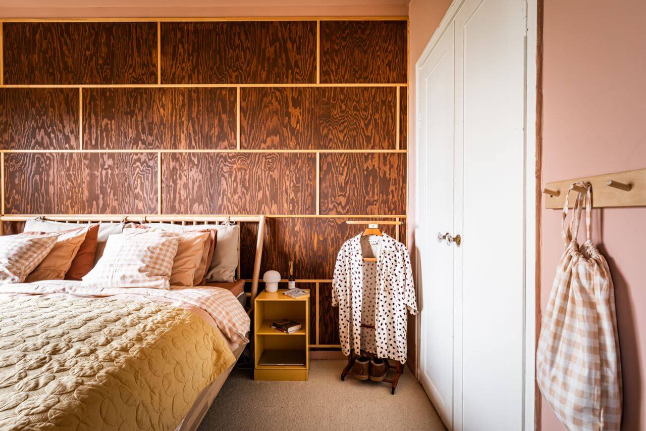 pink-bedroom-wood-walls-nordroom