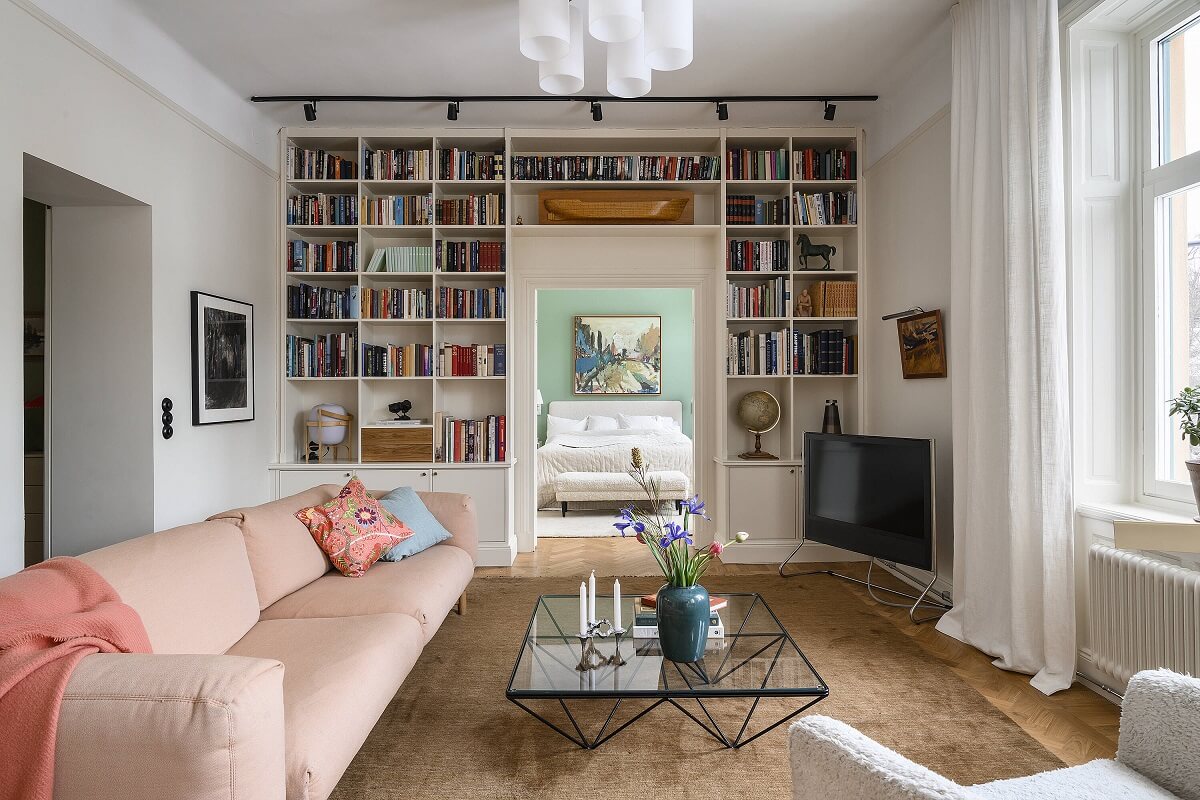 sitting-room-built-in-bookshelves-pink-sofa-nordroom