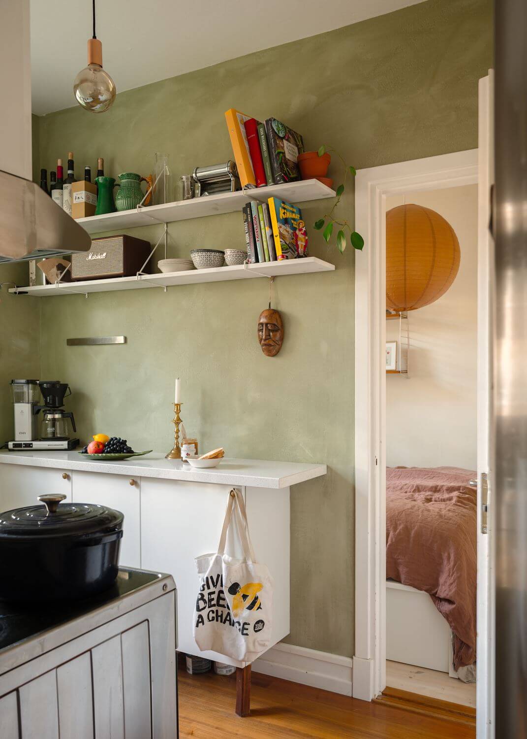 small-kitchen-green-walls-open-shelves-nordroom