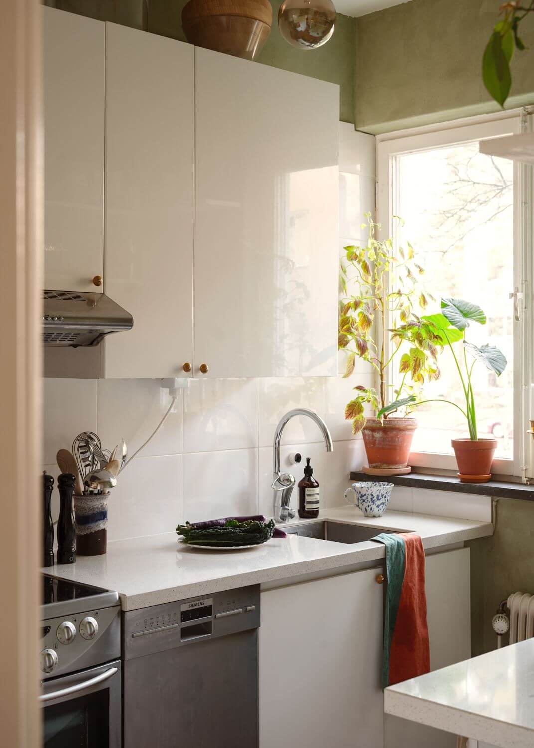 white-kitchen-green-walls-nordroom
