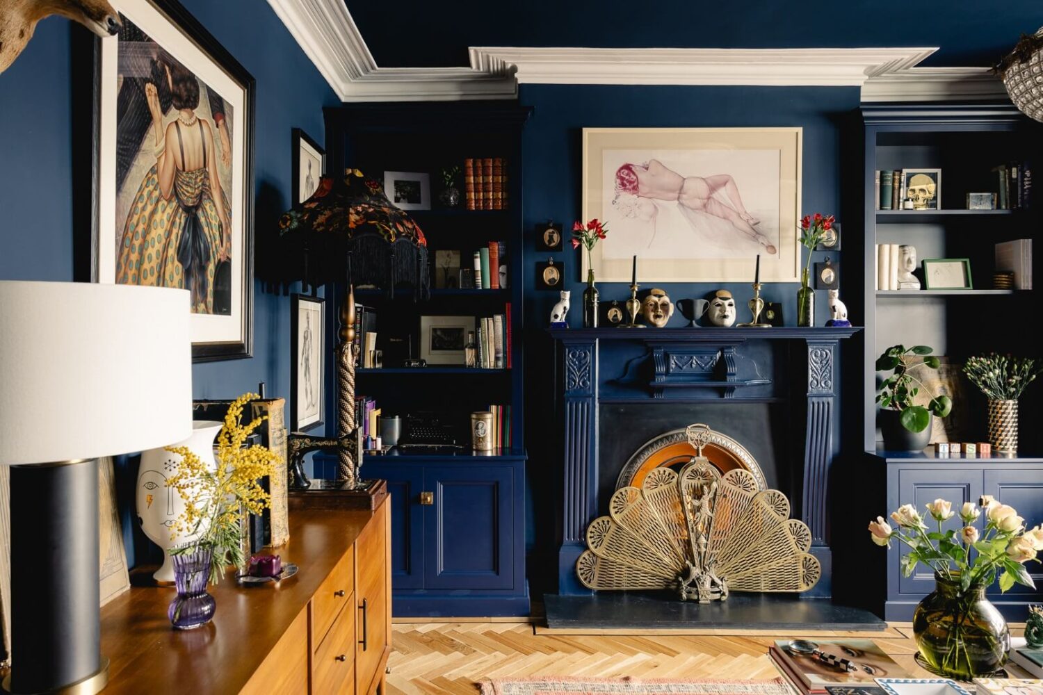 blue-sitting-room-fireplace-bookshelves-nordroom