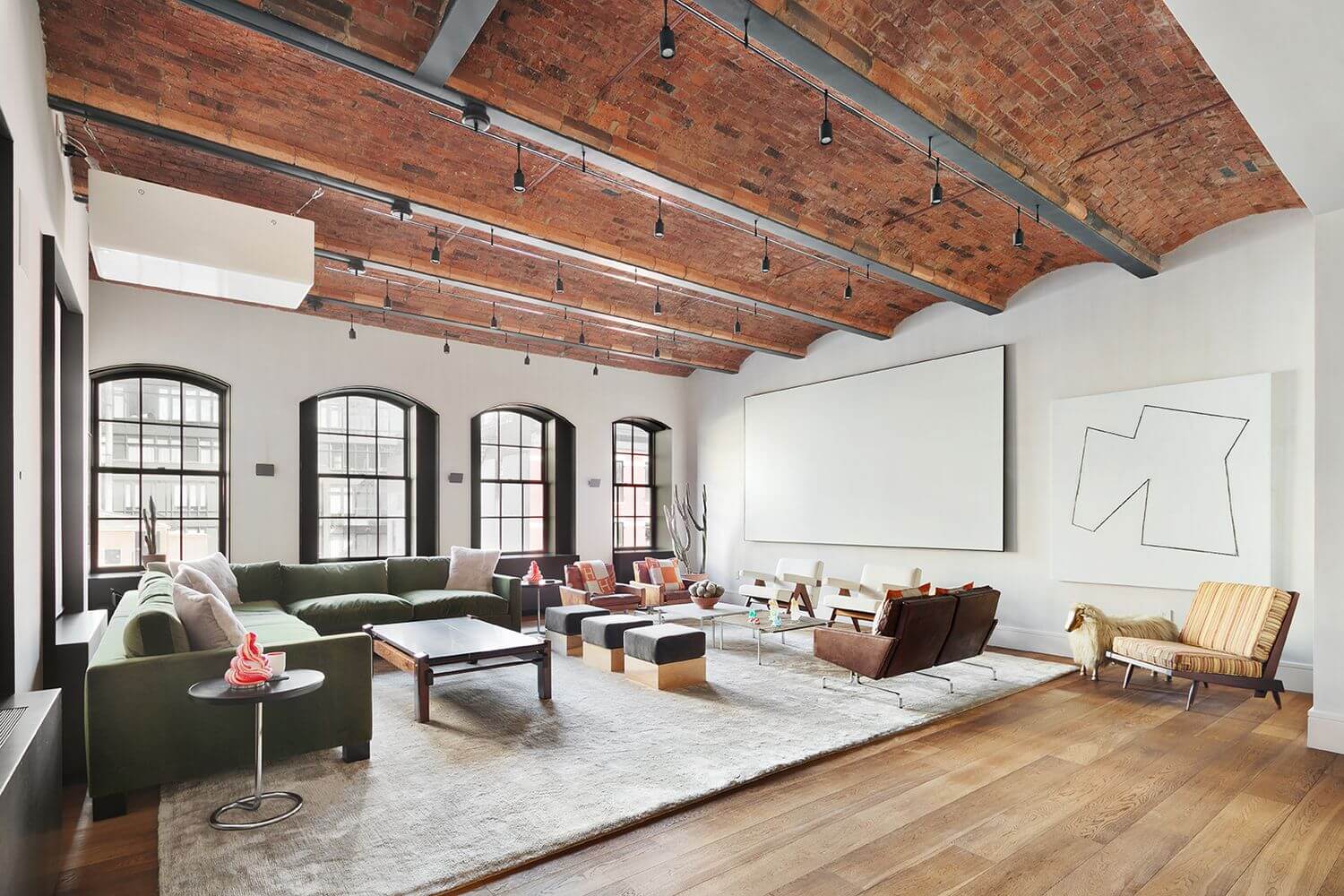 Jonah Hill Sells His Modern Manhattan Loft 1 contemporary-manhattan-loft-jonah-hill-vaulted-ceiling-art-nordroom