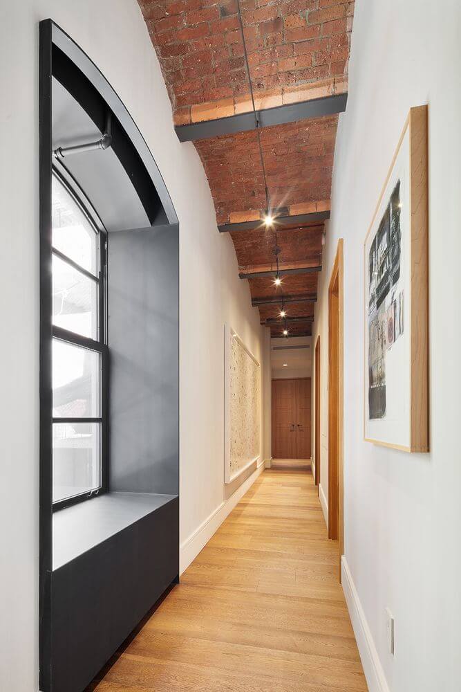 hallway-vaulted-ceiling-contemporary-manhattan-loft-jonah-hill-nordroom