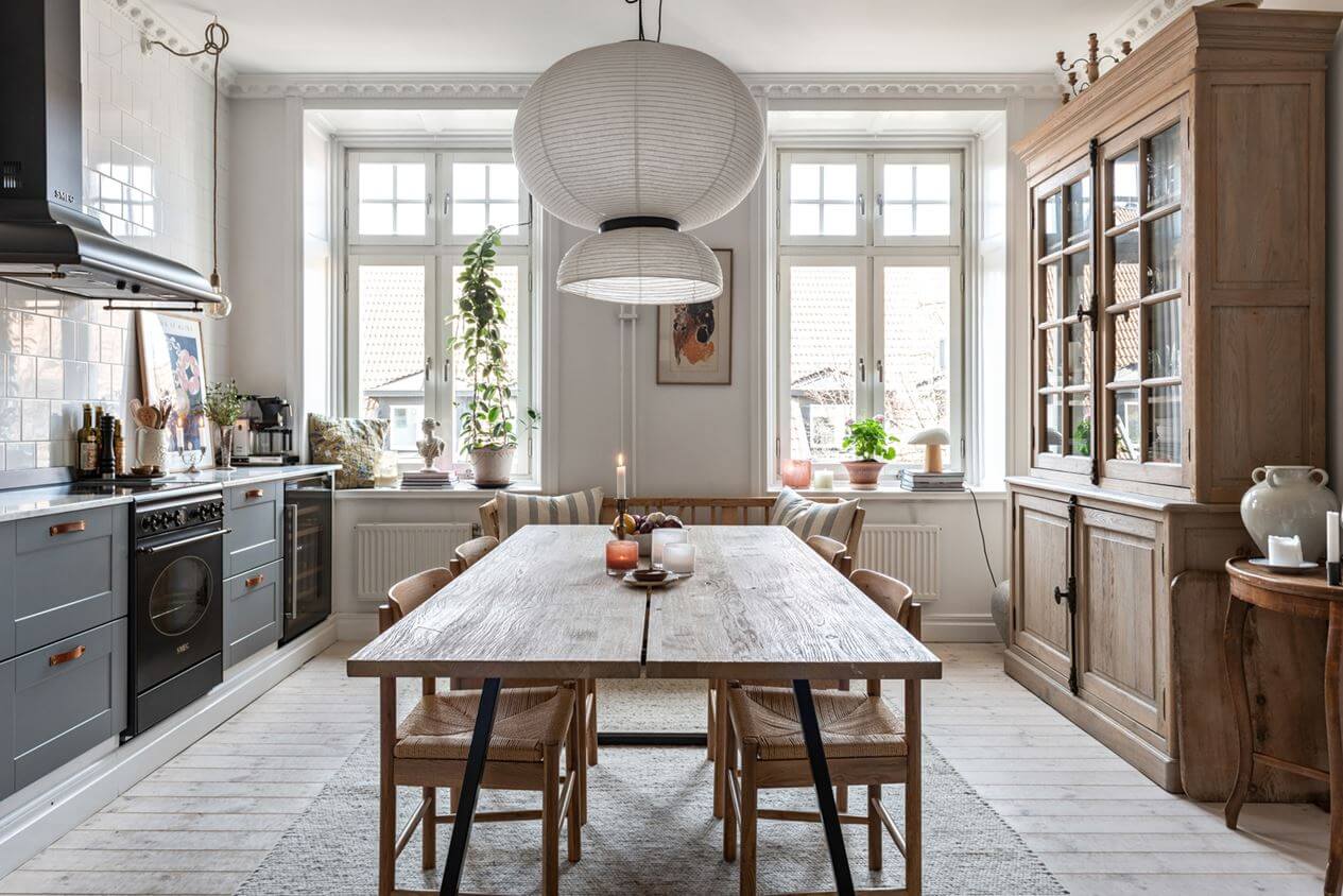large-scandinavian-kitchen-gray-cabinets-large-wooden-dining-table-nordroom