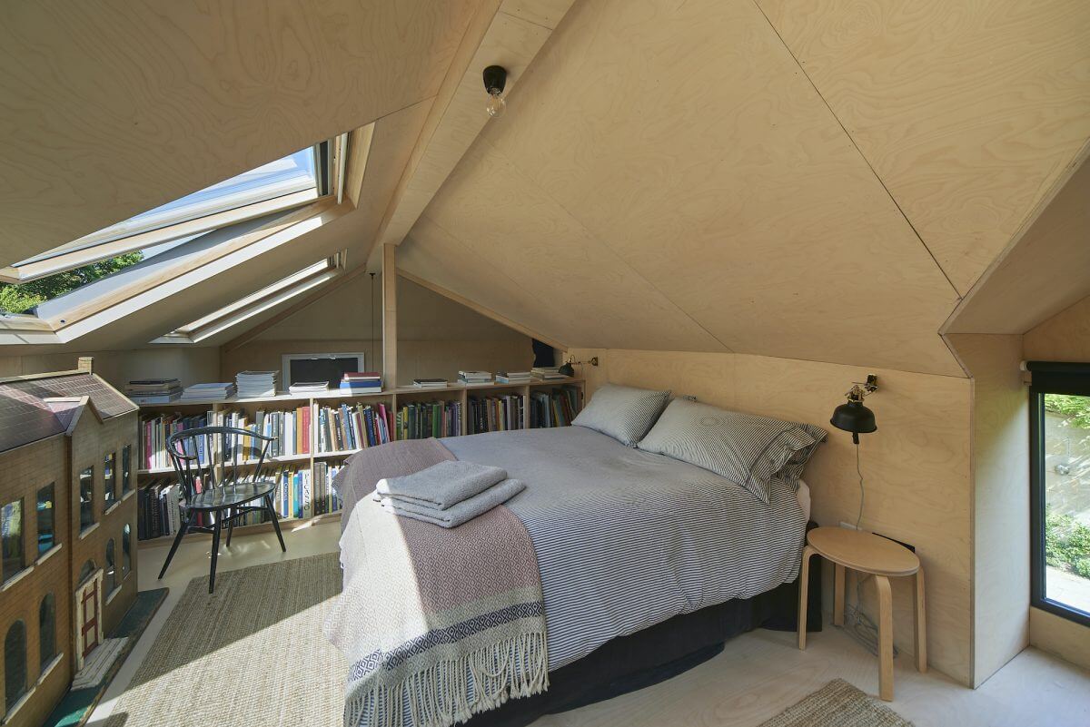 loft-bedroom-bookshelves-skylight-contemporary-art-studio-nordroom