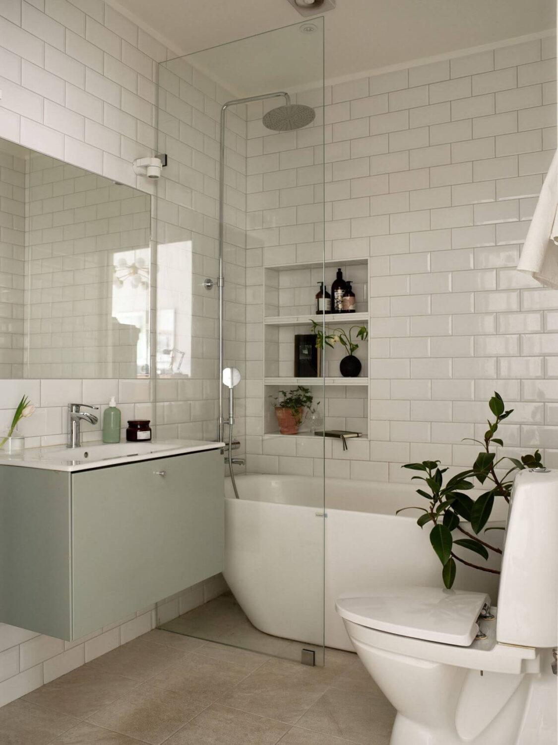 minimalistic-bathroom-freestanding-bath-storage-niche-white-tiles-nordroom