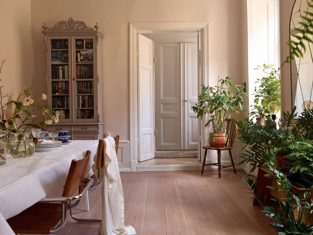 plant-filled-dining-room-wooden-floor-nordroom