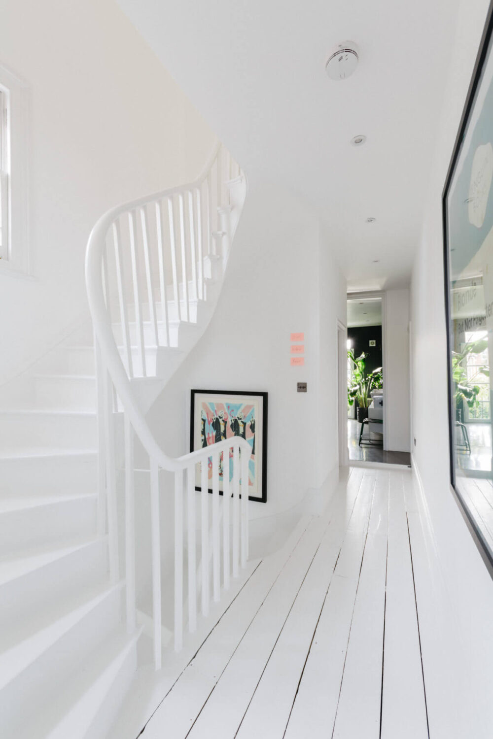 white-landing-staircase-white-floor-nordroom