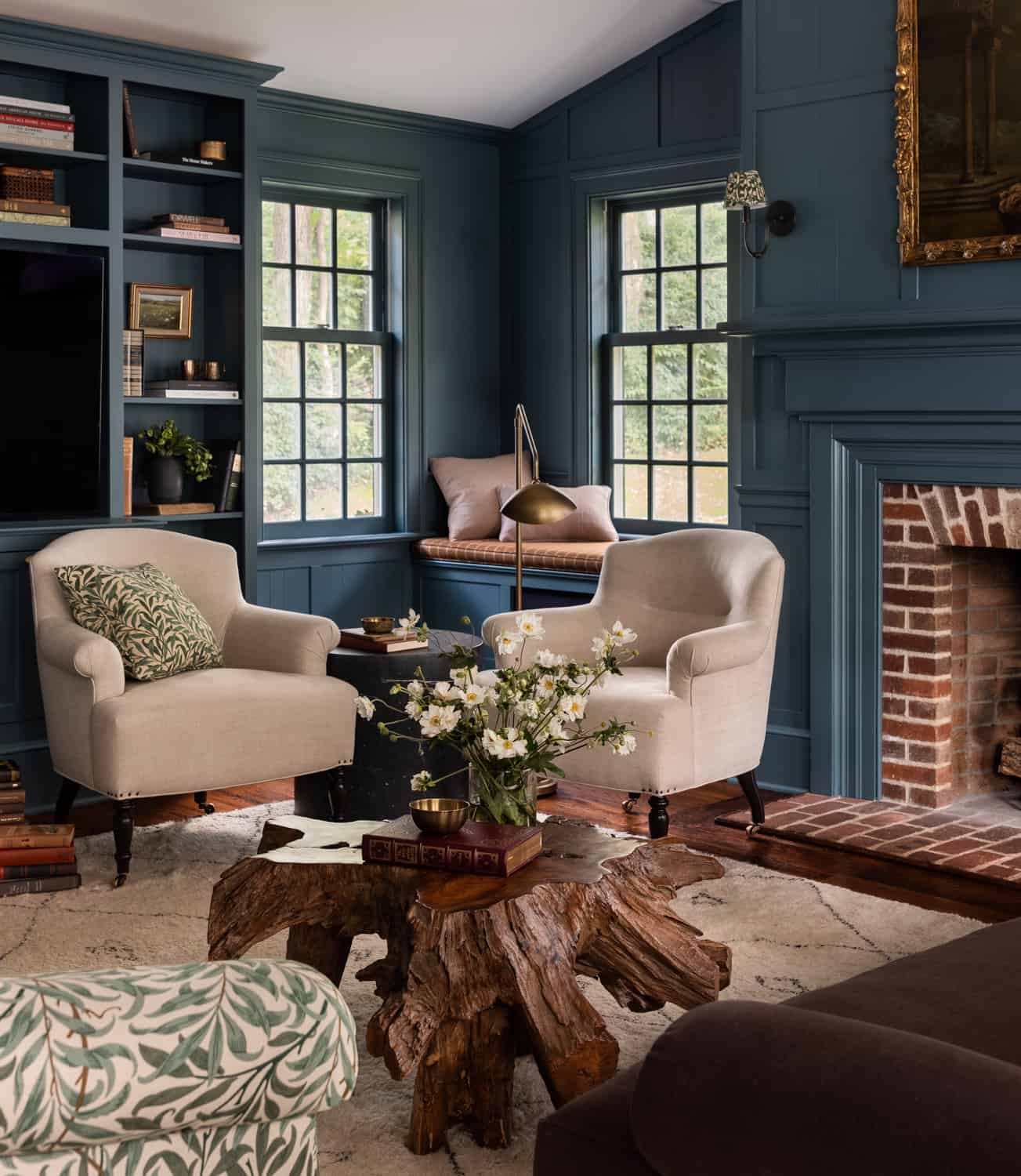 Heidi-Caillier-Design-Hudson-Valley-house-dark-blue-family-room-william-morris-sofa-vintage-floral-painting-cozy-nordroom