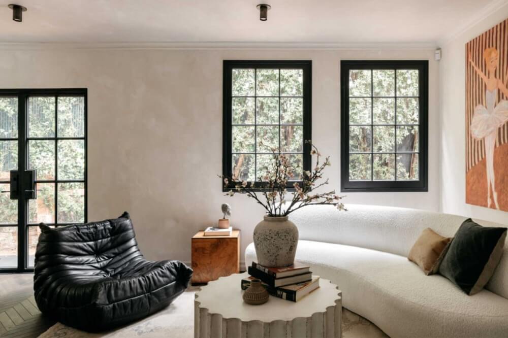 black-white-living-room-curved-sofa-nordroom