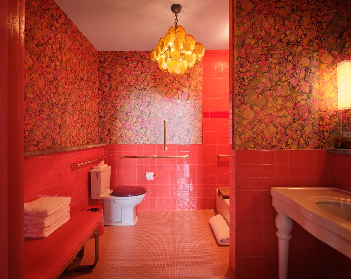 coral-pink-bathroom-pink-wallpaper-hotel-saint-vincent-new-orleans-nordroom