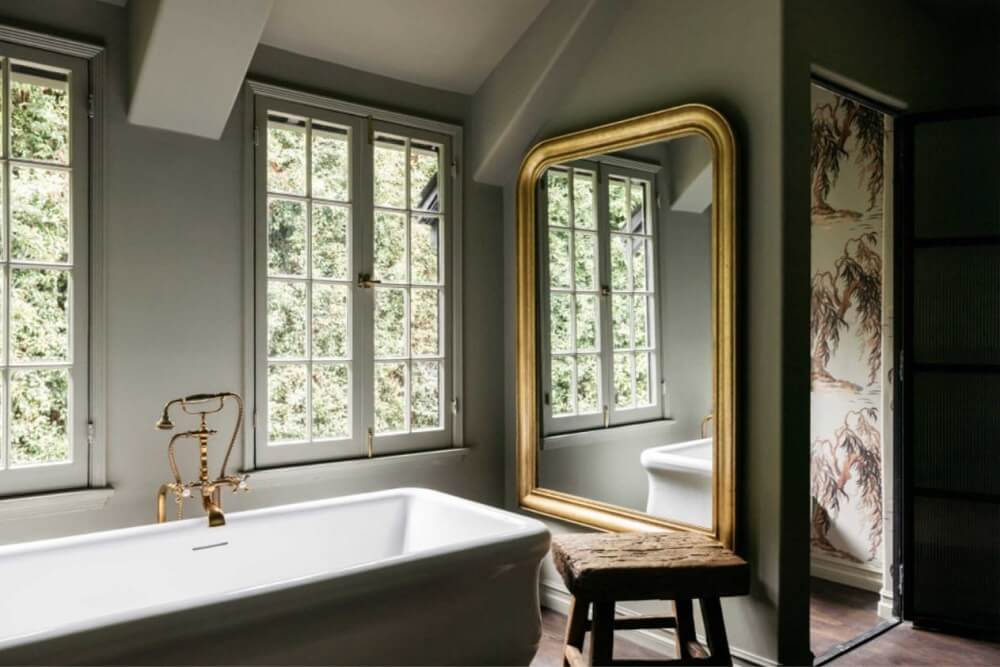 freestanding-bath-green-walls-large-mirror-bathroom-nordroom