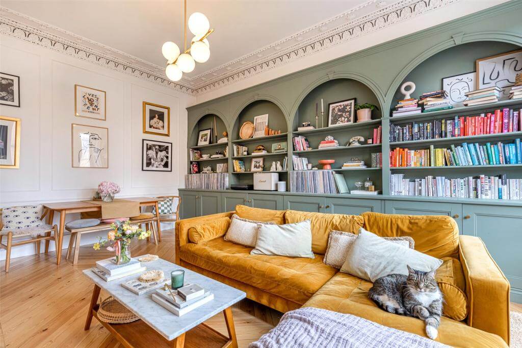 green-custom-made-bookshelves-arches-yellow-sofa-period-details-glasgow-flat-kate-spiers-nordroom