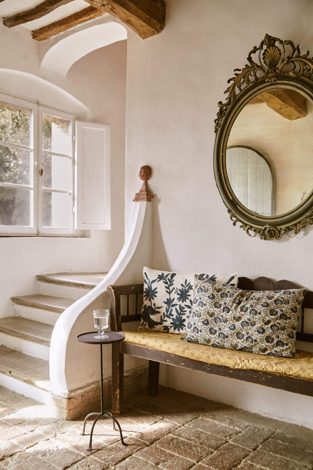 hallway-stone-floor-antique-round-mirror-tuscan-villa-zara-home-nordroom