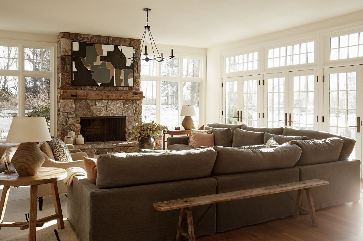 light-sitting-room-corner-sofa-stone-fireplace-nordroom