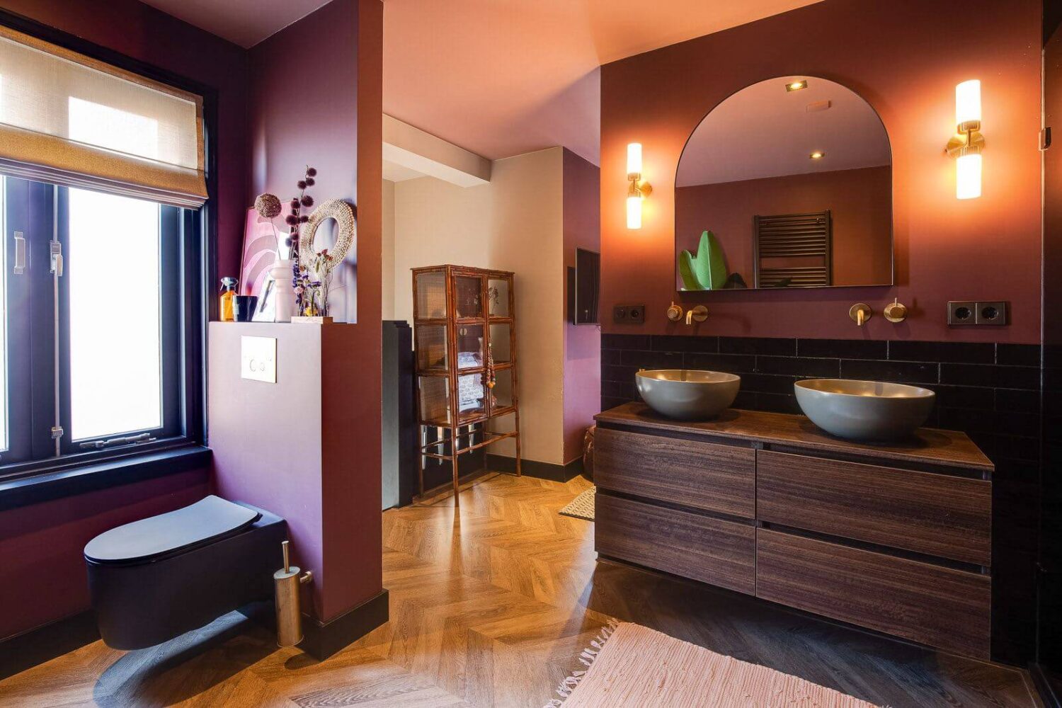 master-bathroom-black-toilet-warm-terracotta-walls-nordroom