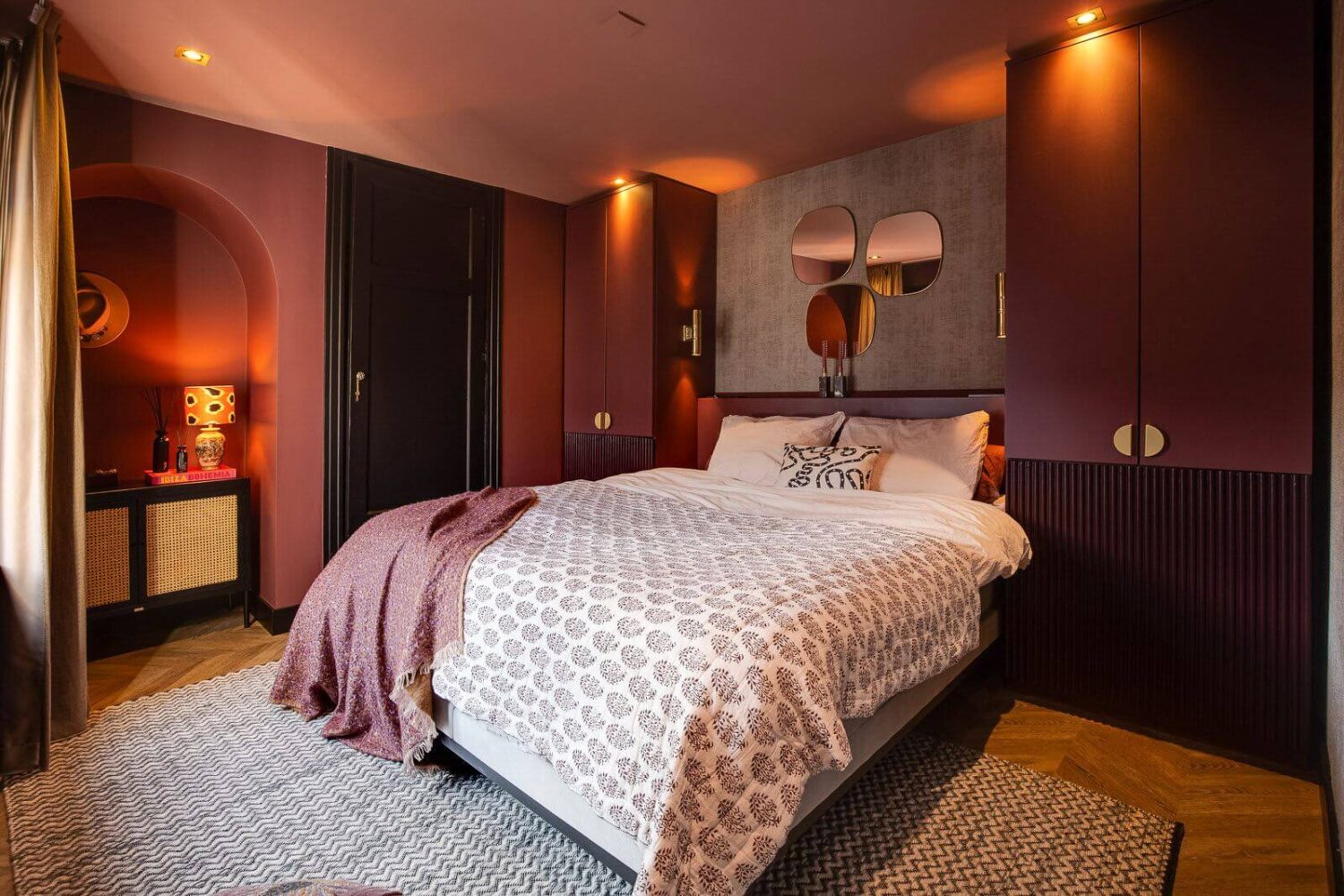 master-bedroom-warm-pink-walls-built-in-wardrobes-nordroom