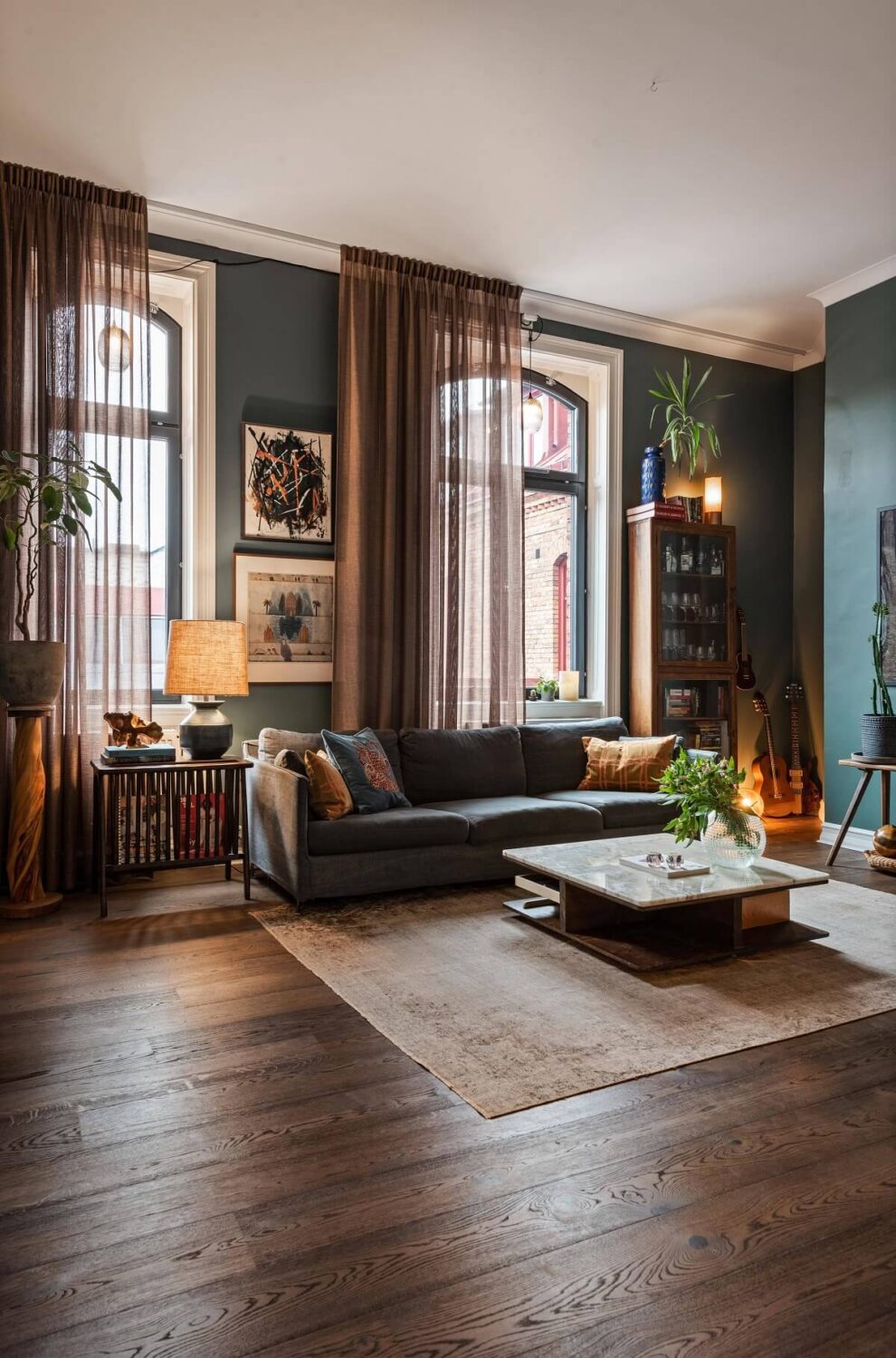 moody-green-living-room-wooden-floor-nordroom