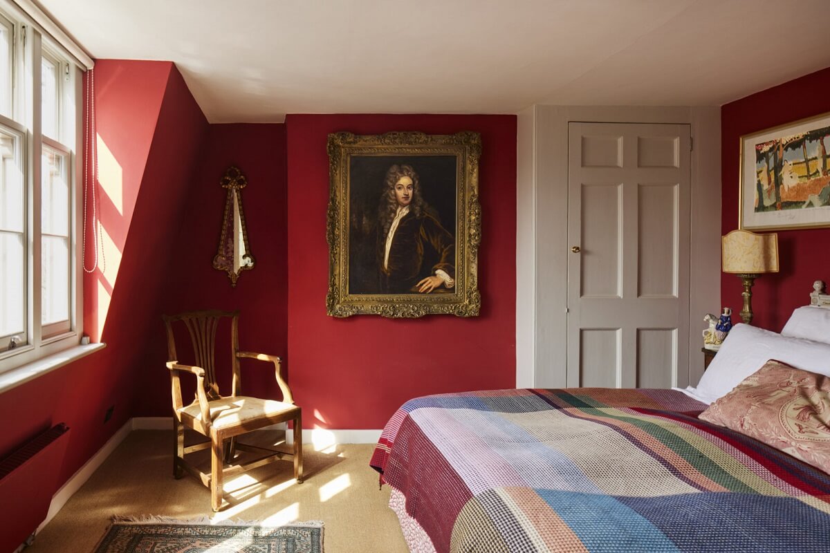 red-bedroom-portrait-painting-eclectic-london-home-nordroom
