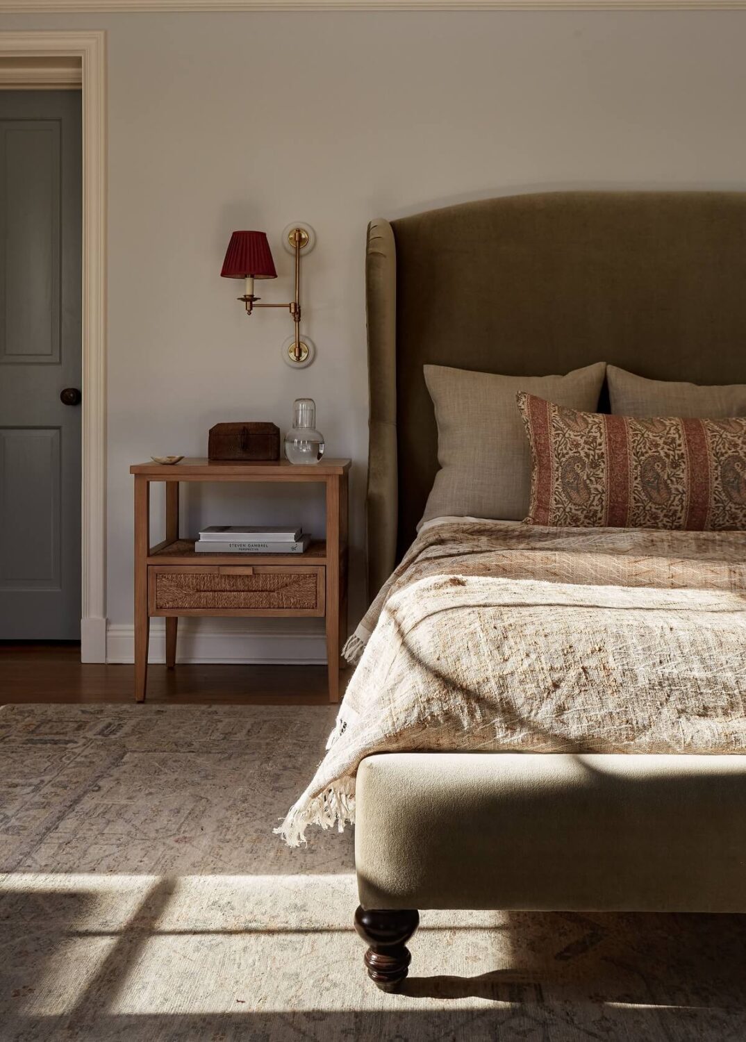 warm-master-bedroom-velvet-bedframe-family-home-nordroom