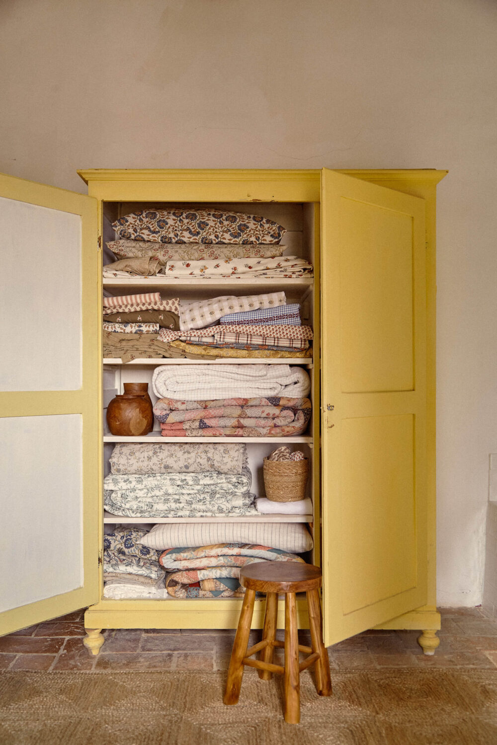 yellow-linen-closet-tuscan-villa-zara-home-nordroom