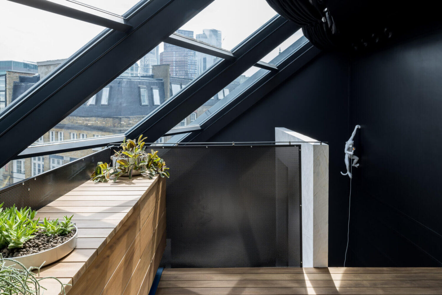 attic-bedroom-skylights-modern-black-loft-nordroom