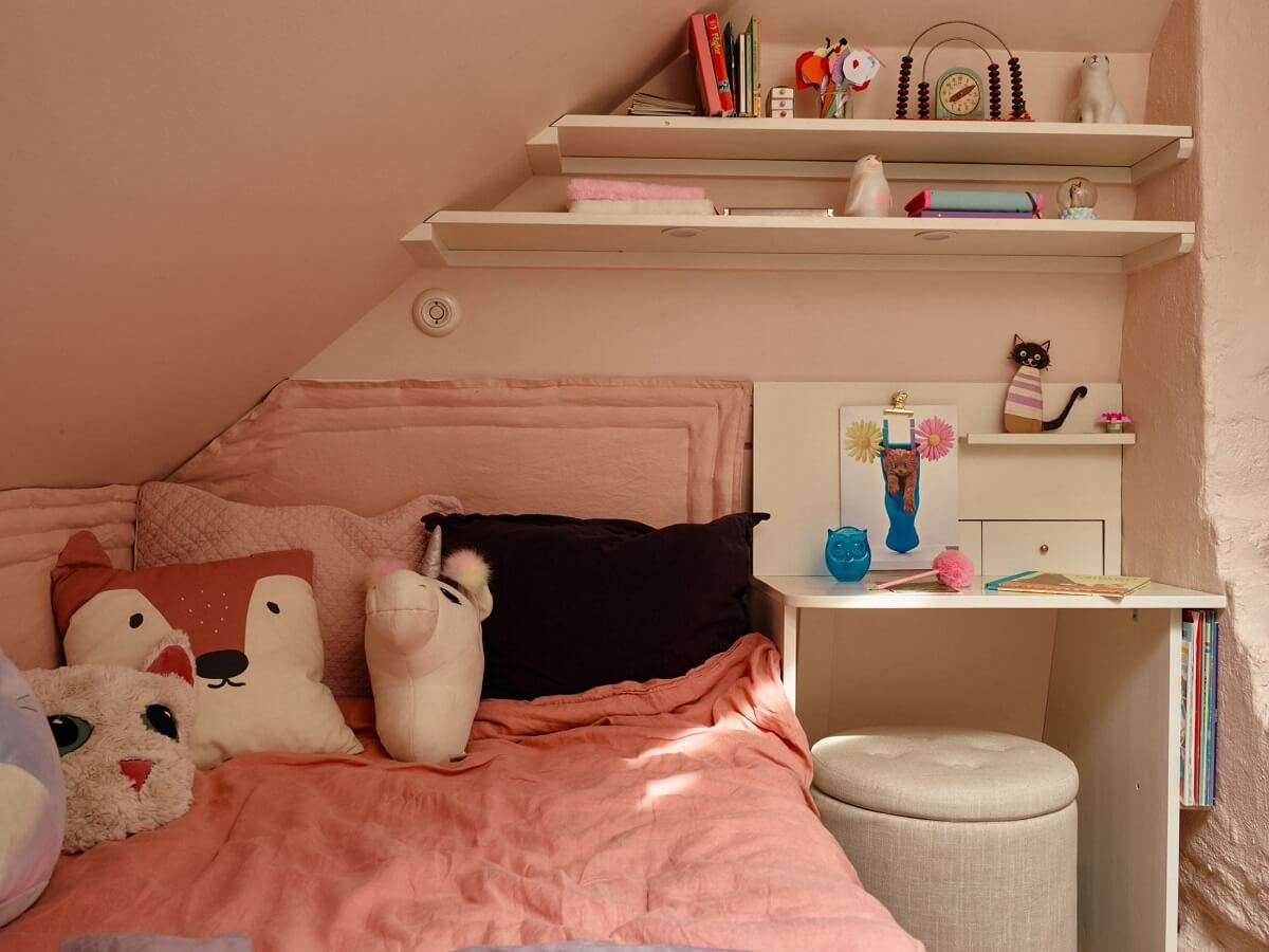 attic-kids-bedroom-slanted-ceiling-desk-shelves-nordroom