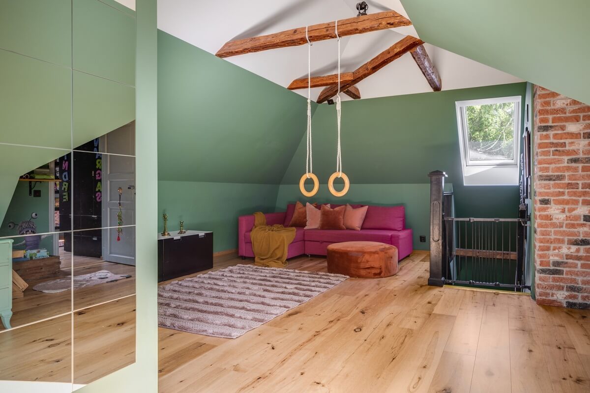 attic-room-green-walls-exposed-beams-nordroom