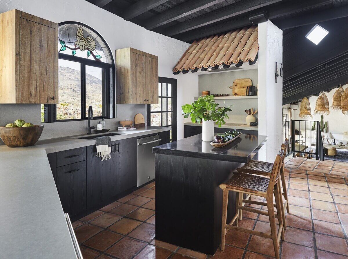 black-kitchen-cabinets-stone-floor-airbnb-bobby-berk-nordroom