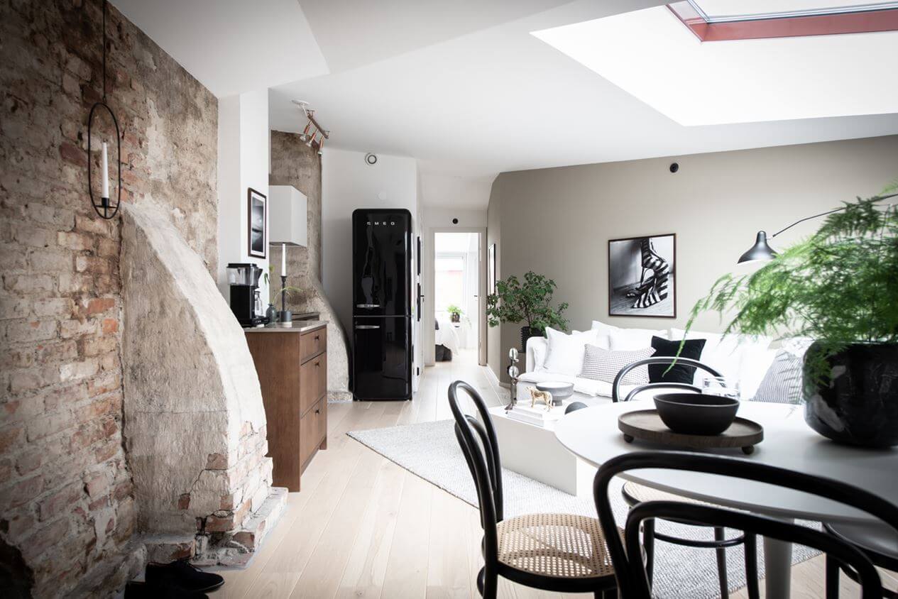 A Light Nordic Attic Loft with Raw Walls and Skylights 1 exposed-brick-wall-attic-apartment-skylight-nordroom