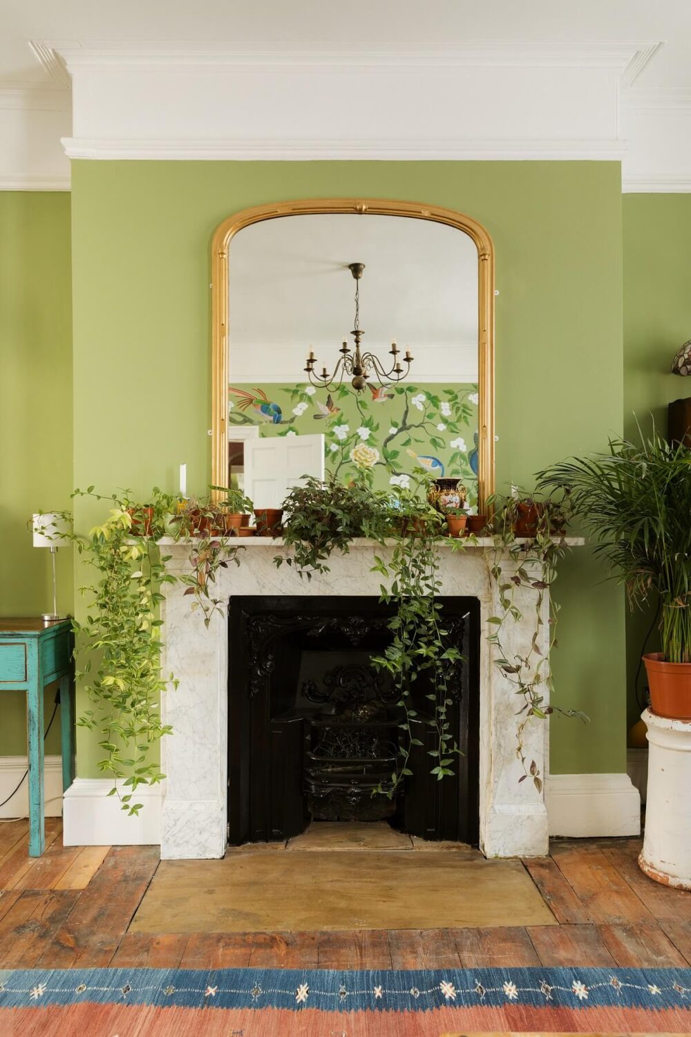 fireplace-green-walls-wooden-floor-nordroom