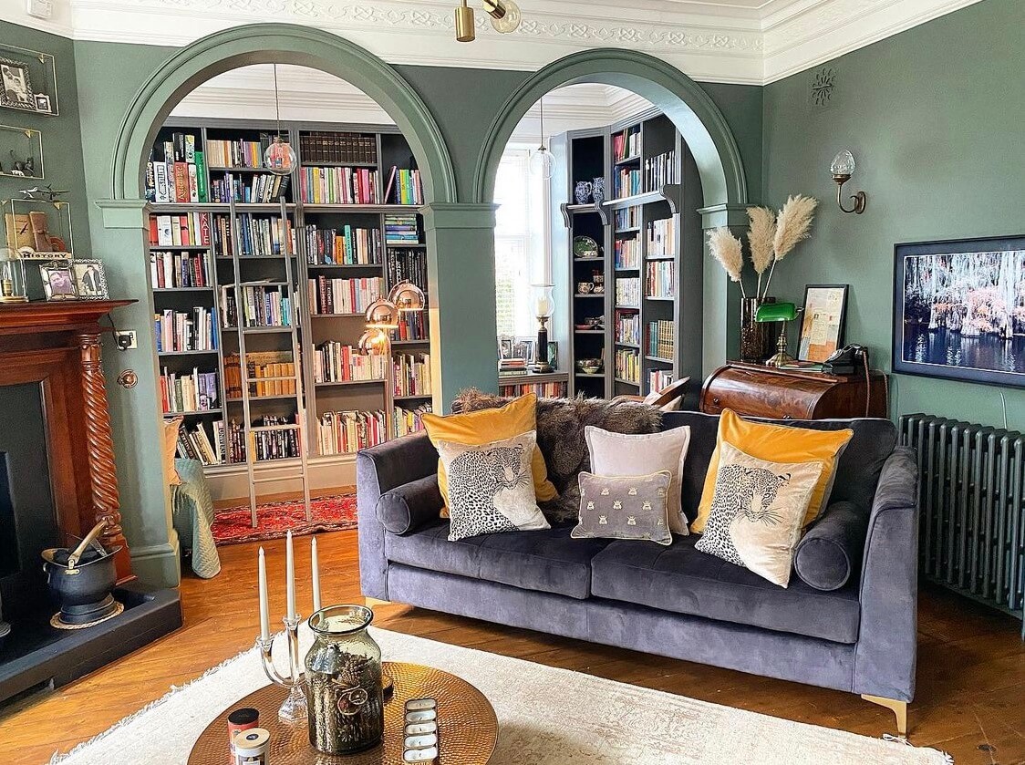 green-sitting-room-fireplace-green-walls-arches-home-library-nordroom