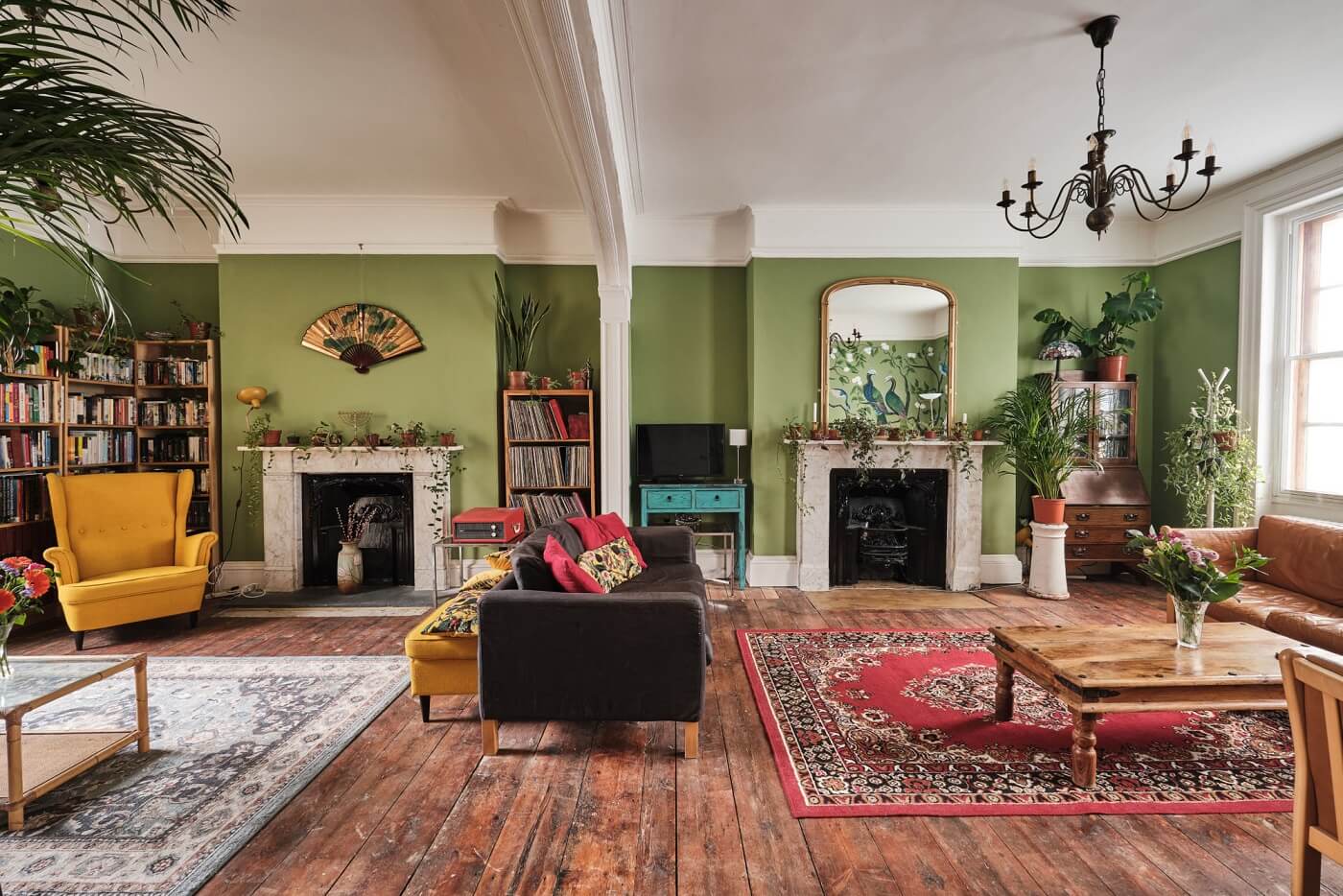 green-sitting-room-wooden-floor-fireplace-nordroom