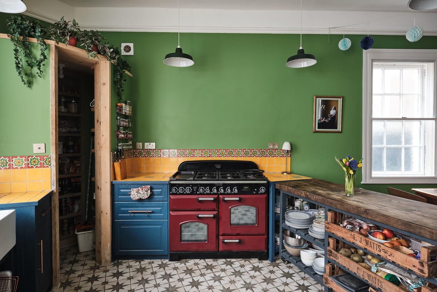 green-walls-blue-kitchen-cabinets-yellow-tiles-colorful-eclectic-home-nordroom
