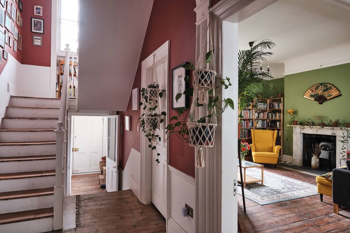 hallway-wooden-floor-red-walls-green-living-room-nordroom
