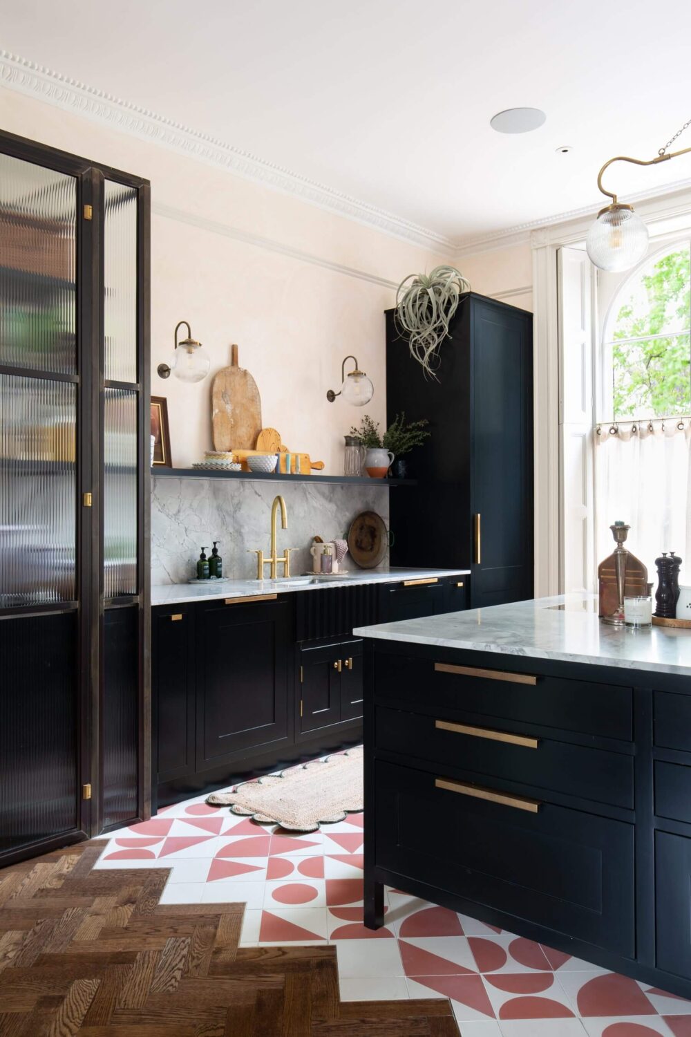 kitchen-dark-blue-cabinets-open-shelf-glass-cabinets-pink-white-floor-tiles-nordroom