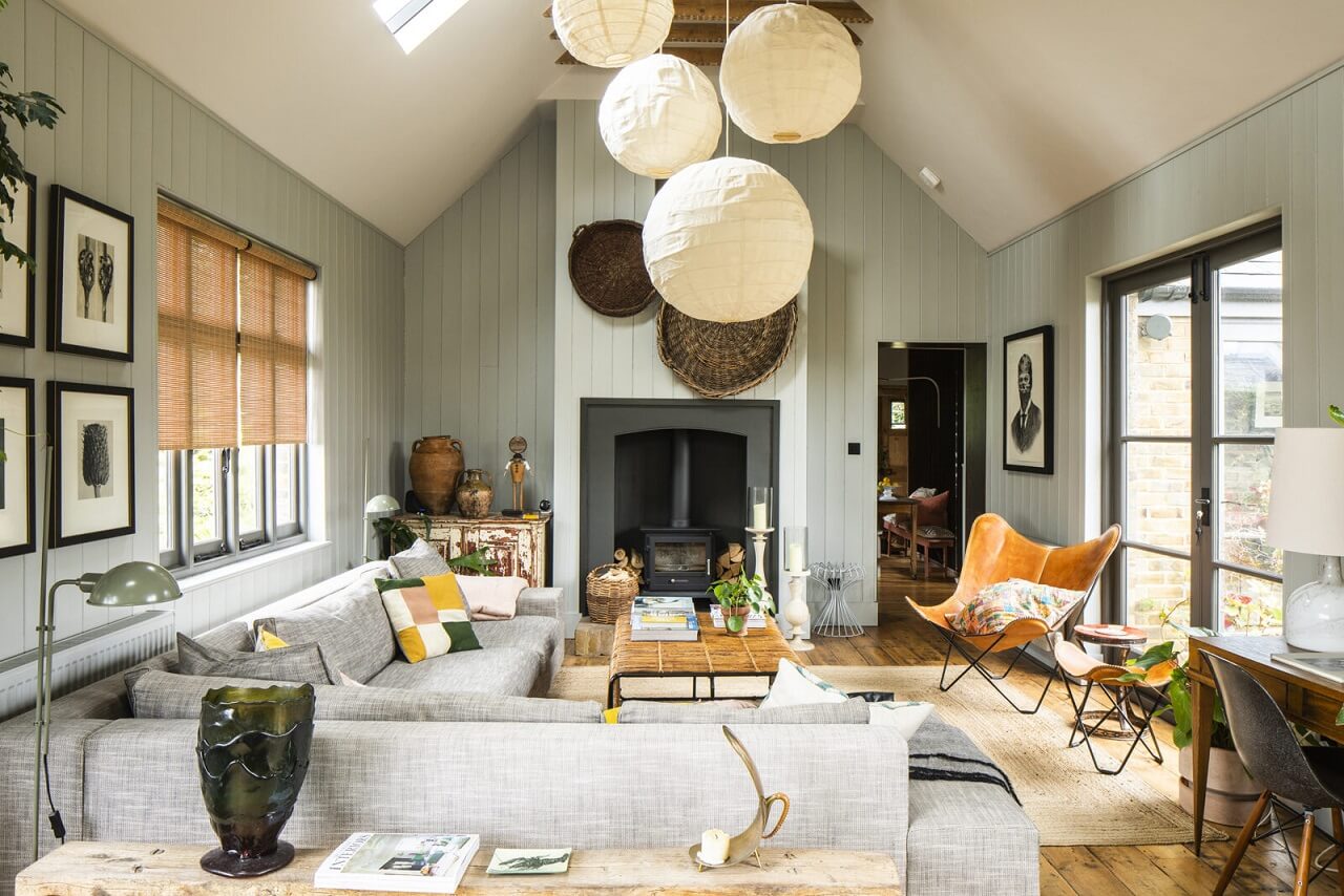 living-room-corner-sofa-slanted-ceiling-fireplace-nordroom
