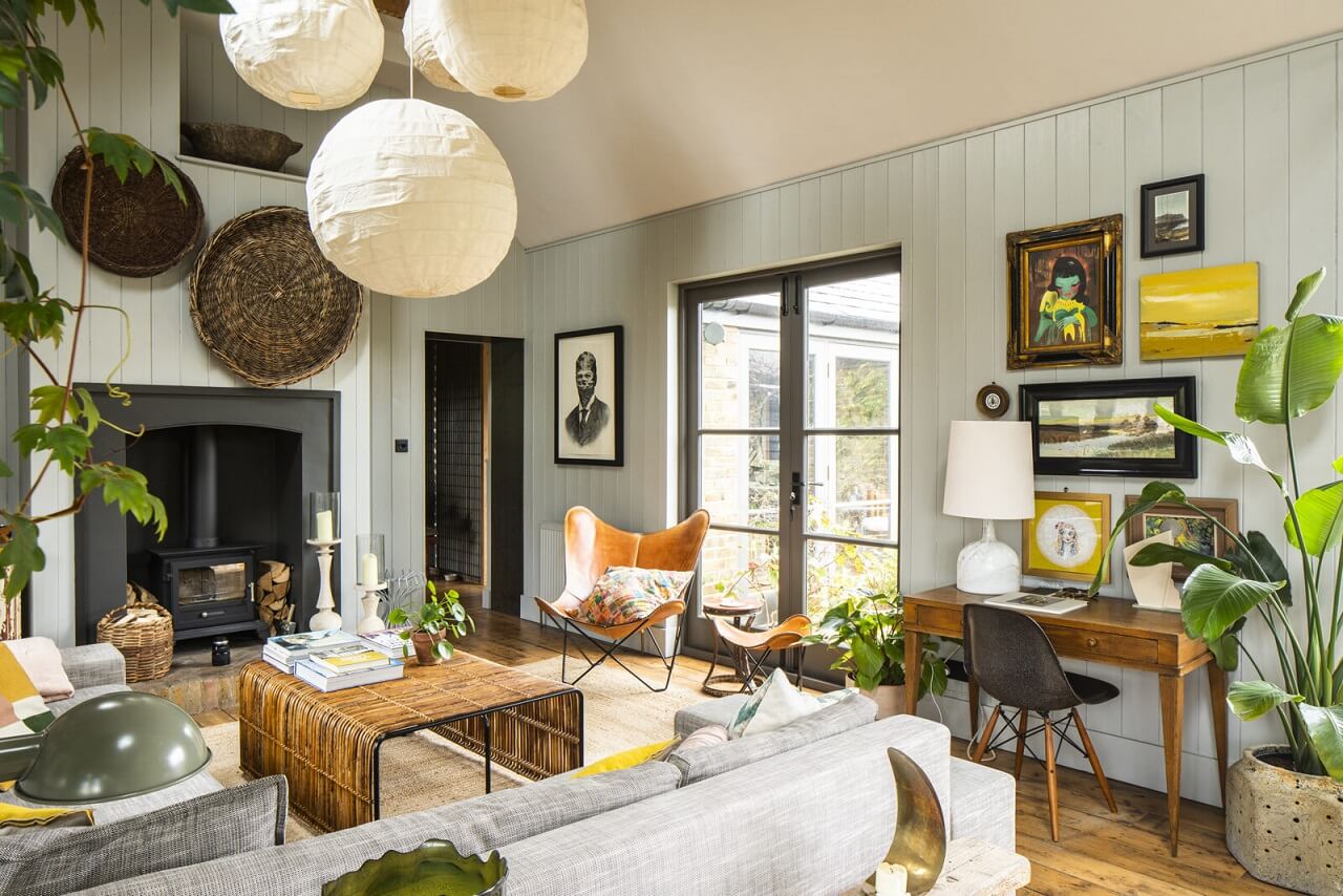 living-room-desk-plants-high-ceilings-wooden-floor-nordroom