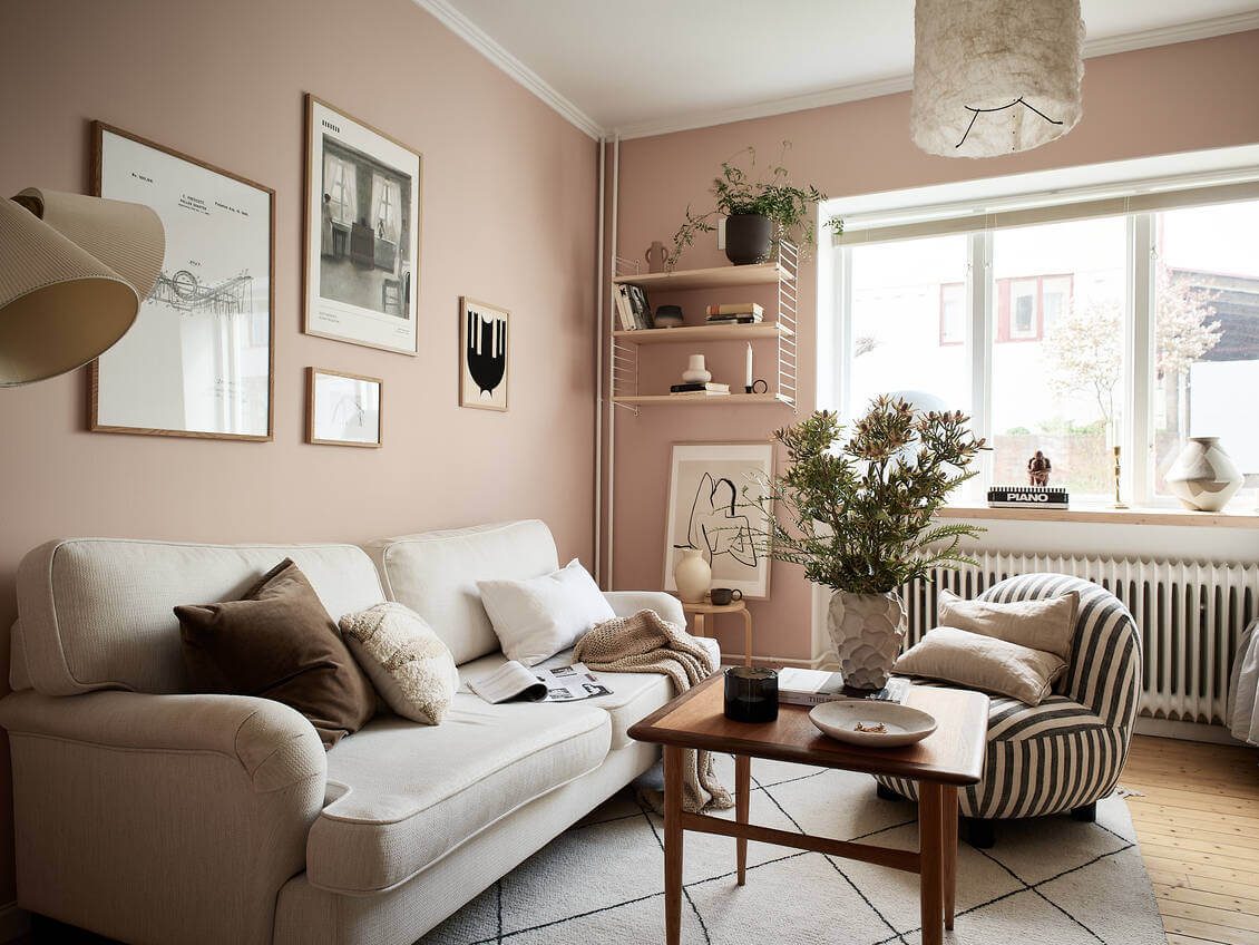 nordic-studio-apartment-pink-walls-striped-chair-nordrom
