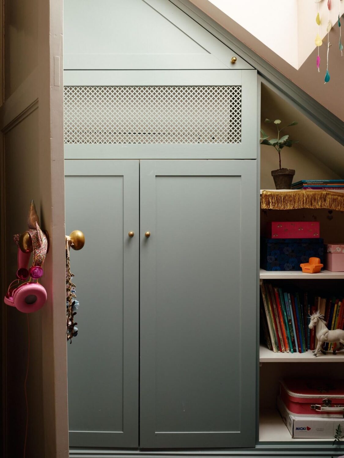 small-kids-bedroom-slanted-ceiling-wardrobe-under-eaves-nordroom