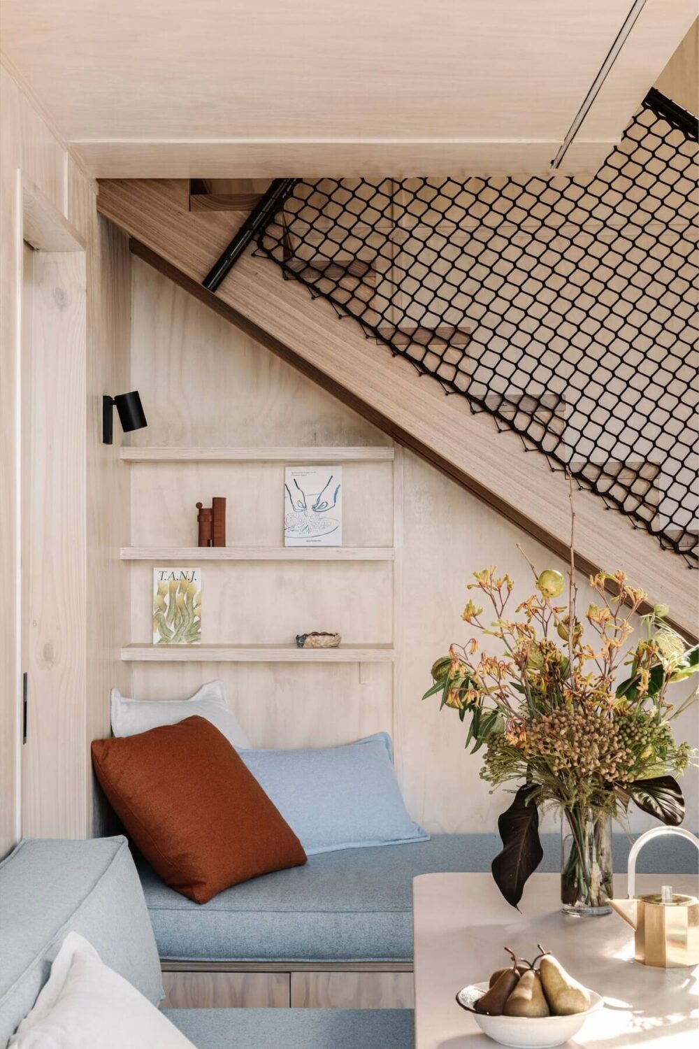 sofa-shelves-small-home-airbnb-australia-nordroom