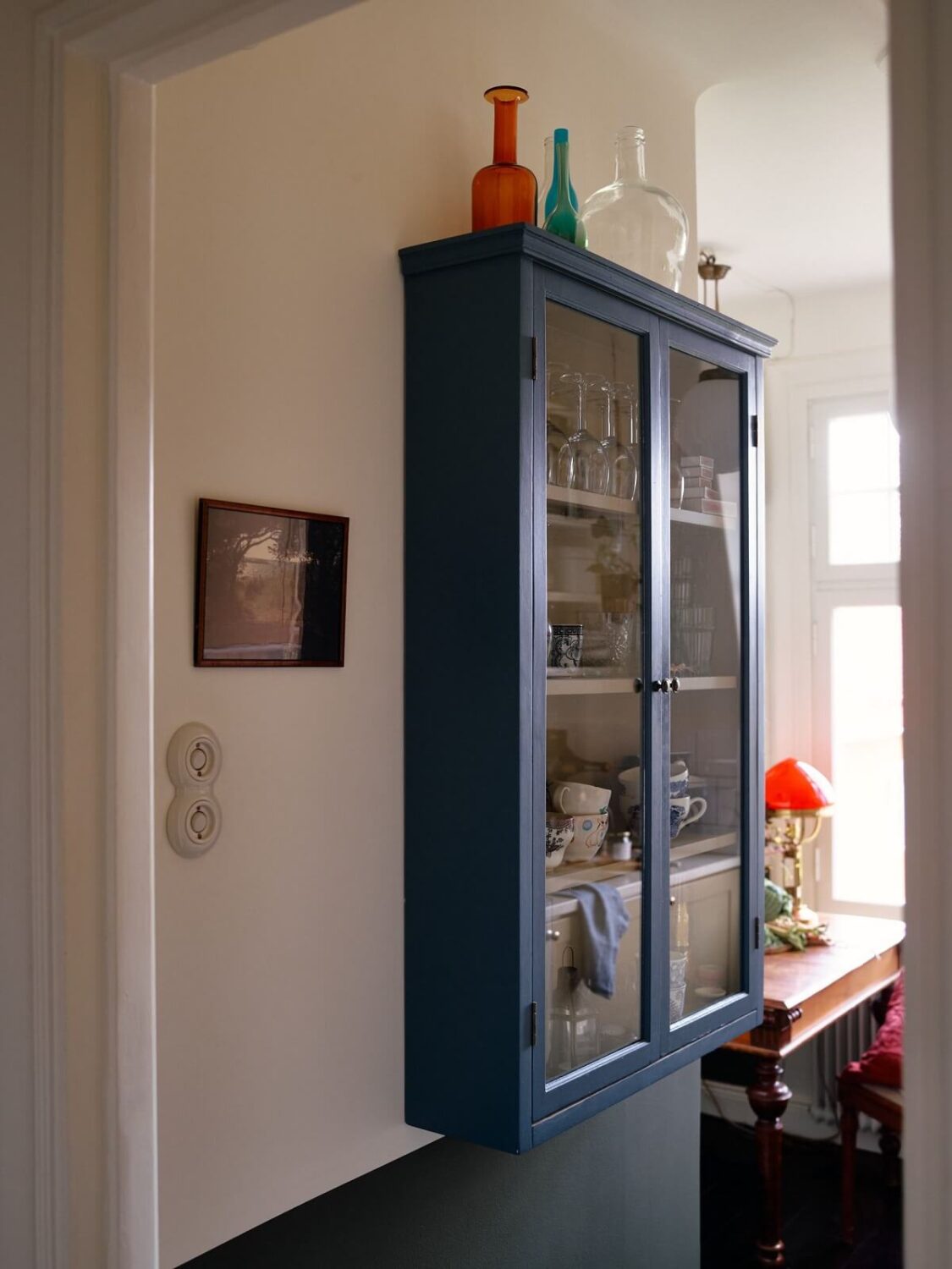 wall-mounted-blue-glass-cabinets-kitchen-nordroom