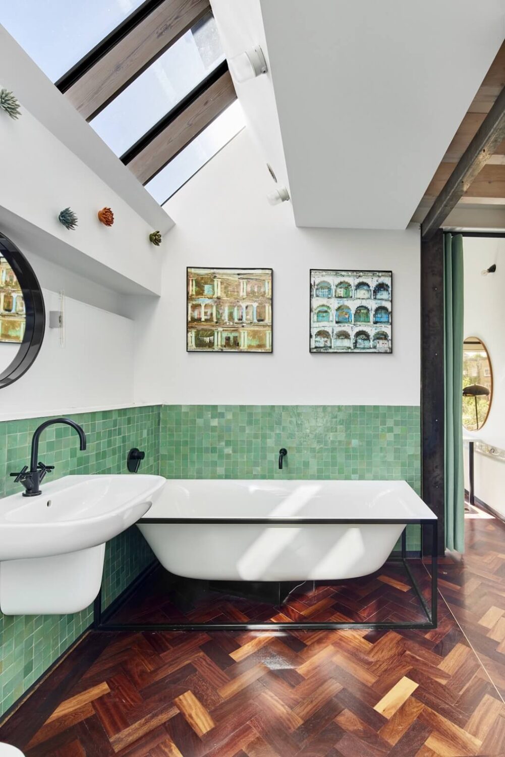 bathroom-reclaimed-mahogany-parquet-floor-green-tiles-bath-tub-skylights-nordroom