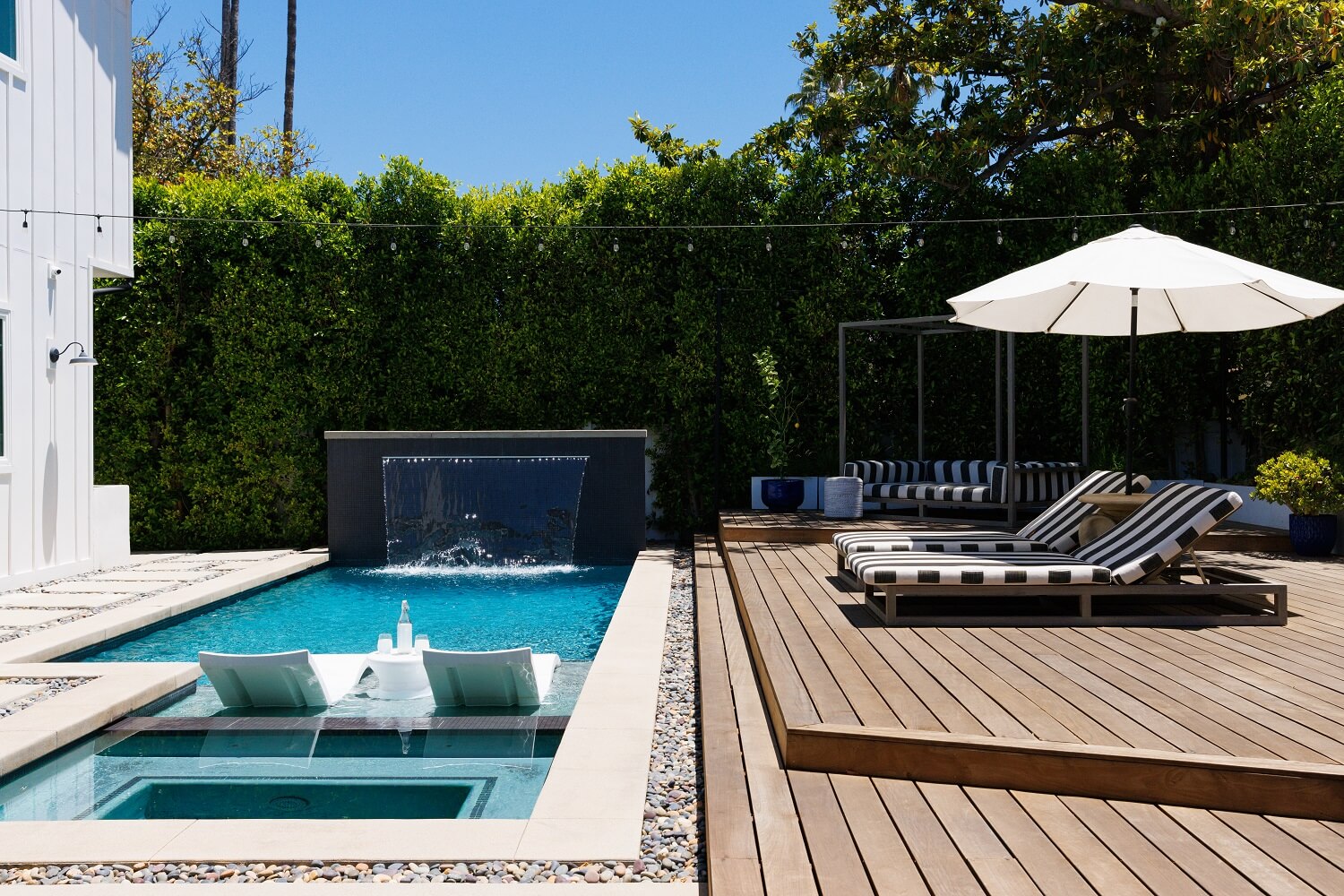 garden-swimming-pool-wooden-terrace-los-angeles-home-daveed-diggs-emmy-raver-lampman-nordroom