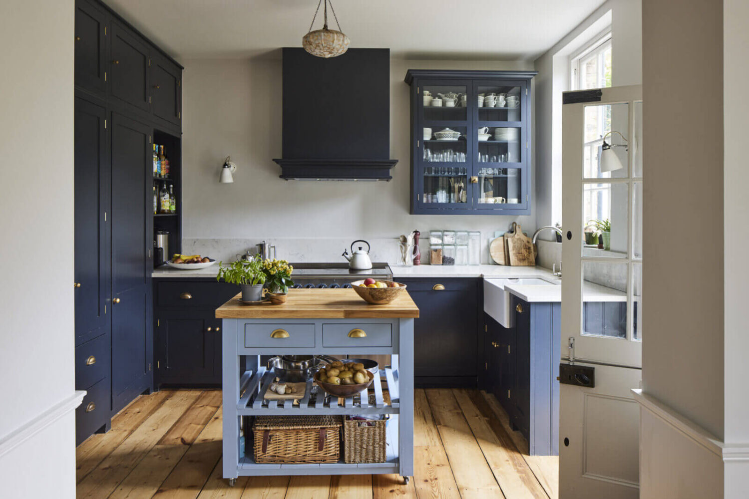 kitchen-blue-cabinets-wooden-floor-island-nordroom